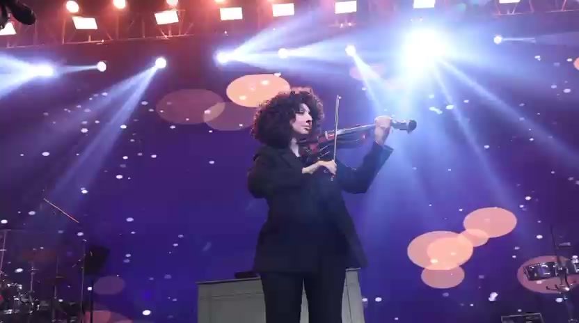 Madina performing live on stage